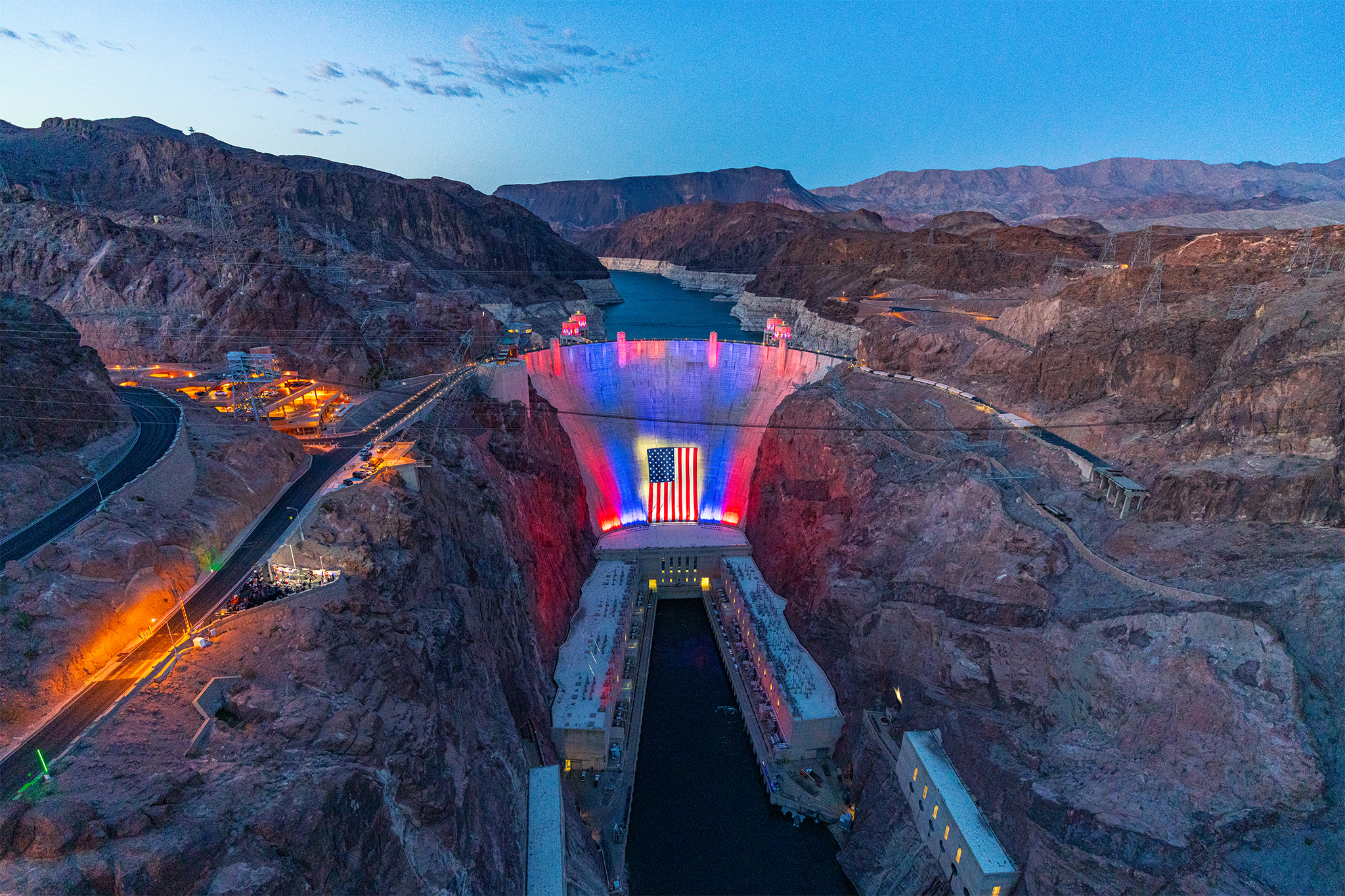 Enormous American flag draped over Hoover Dam as Lake Mead endures severe drought