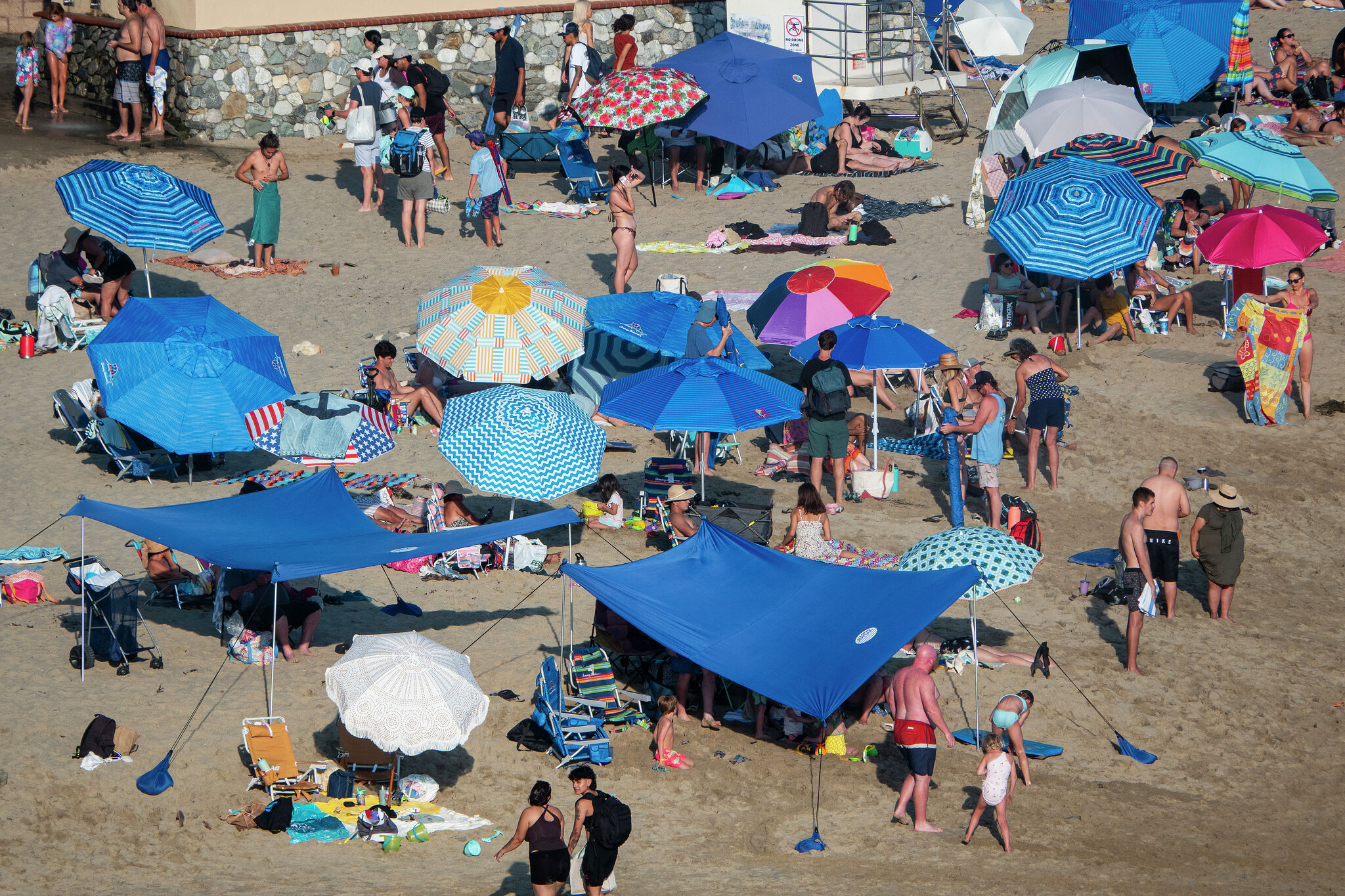 Wealthy Orange County city plans $500 fines for shade structures at beach