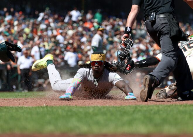 Athletics score 4 times with 2 out in the 9th inning, rally to beat the Giants 9-6