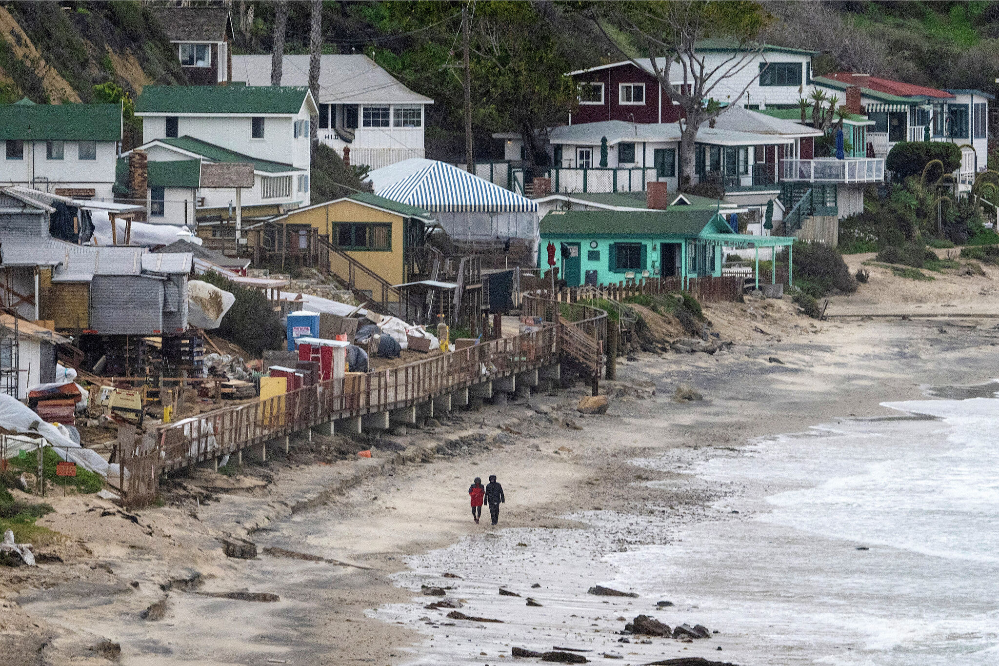 Ultra-rare Calif. beach cottages spared from coastal flooding for now