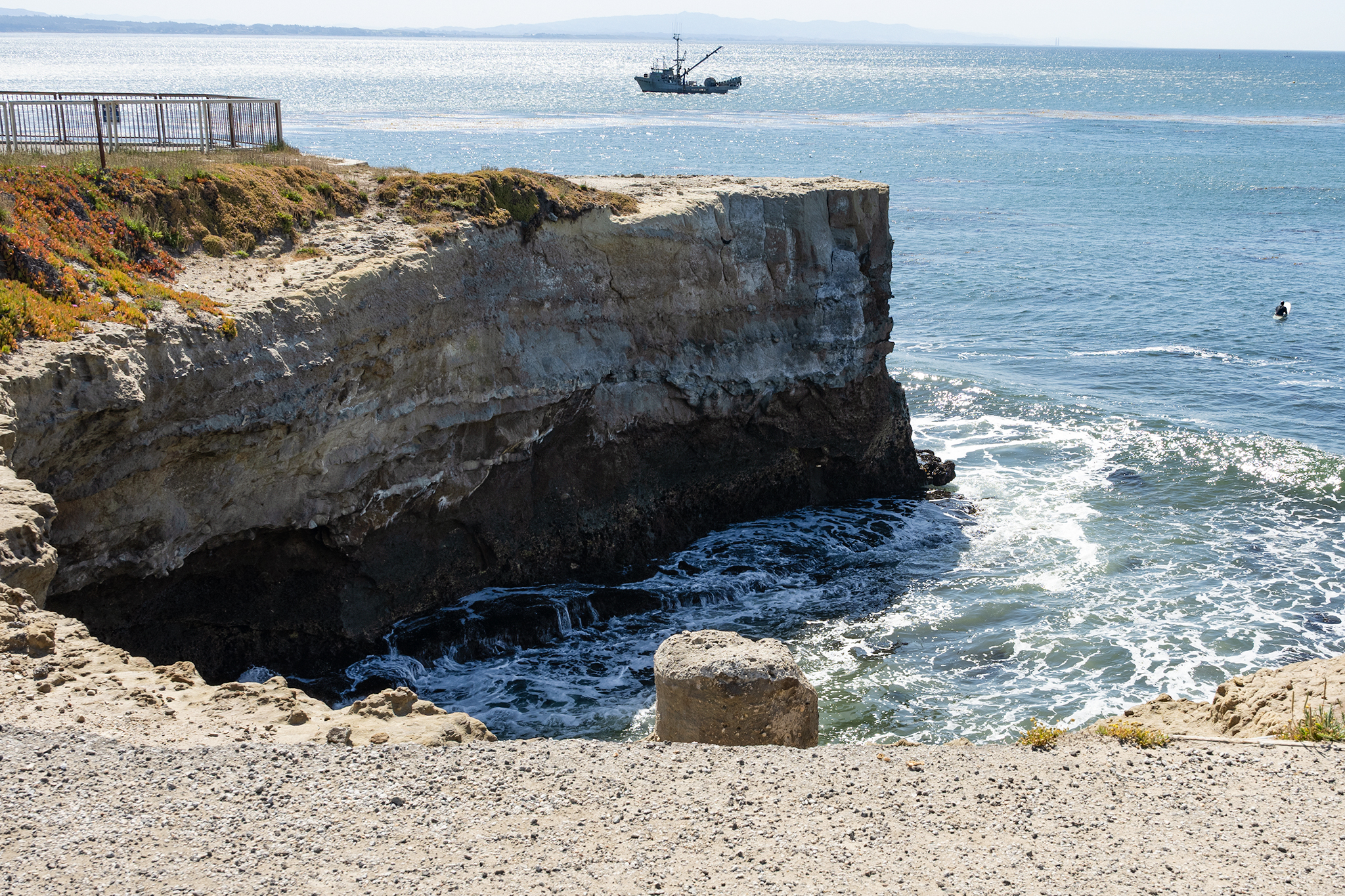 Slab of cliff falls into the ocean at iconic surf break