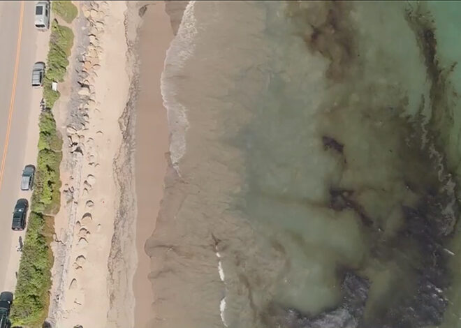 Oil slick stretches hundreds of feet at popular Calif. beach