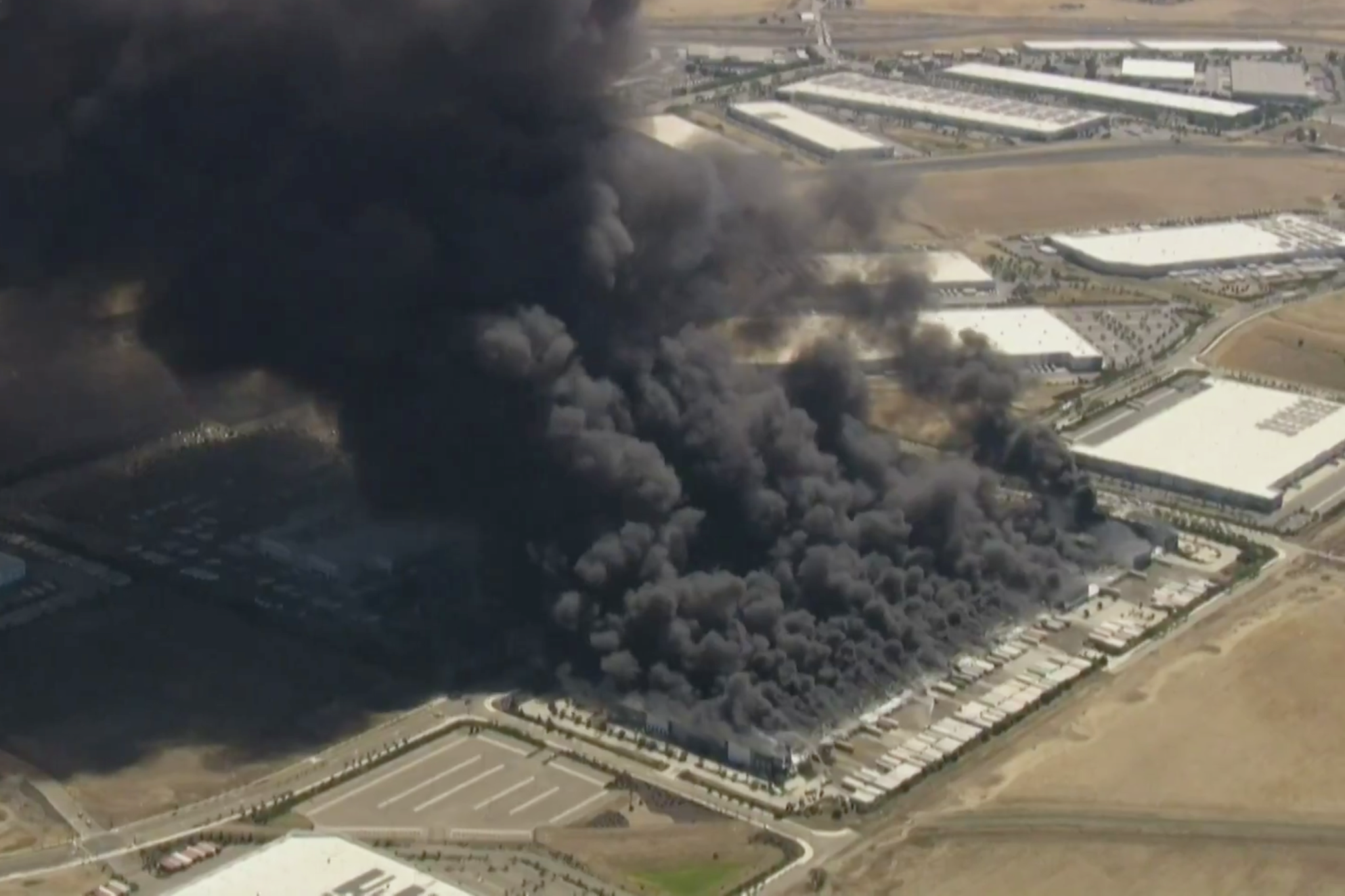 Smoke visible for miles as fire erupts at Tracy medical warehouse