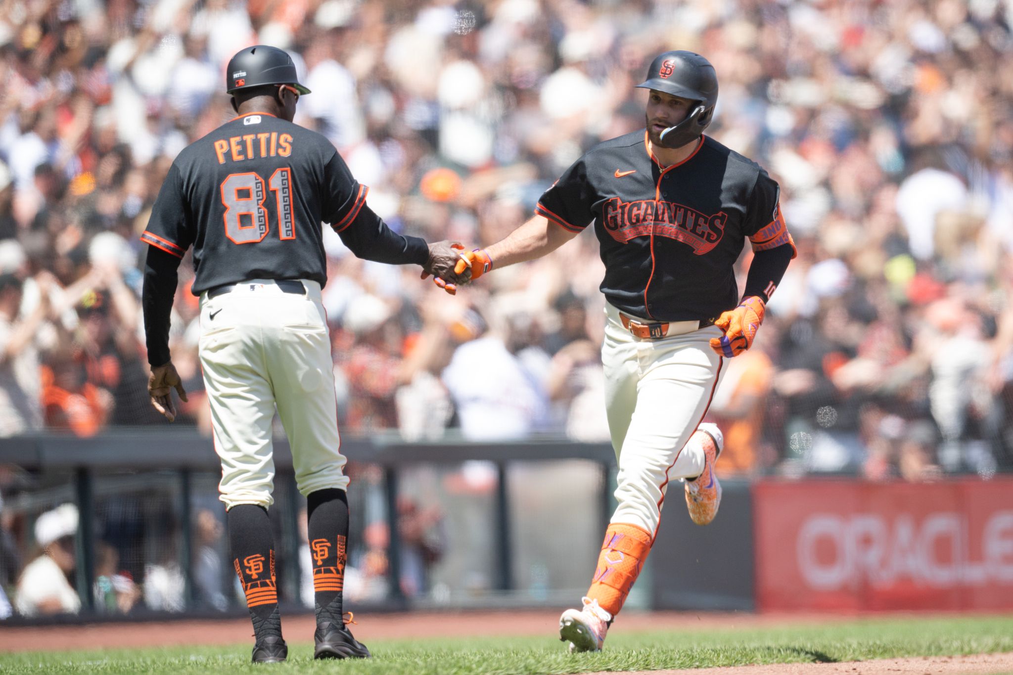 Mahle gets first win since April and Schmitt hits go-ahead, 3-run homer as Giants beat Rockies 4-2