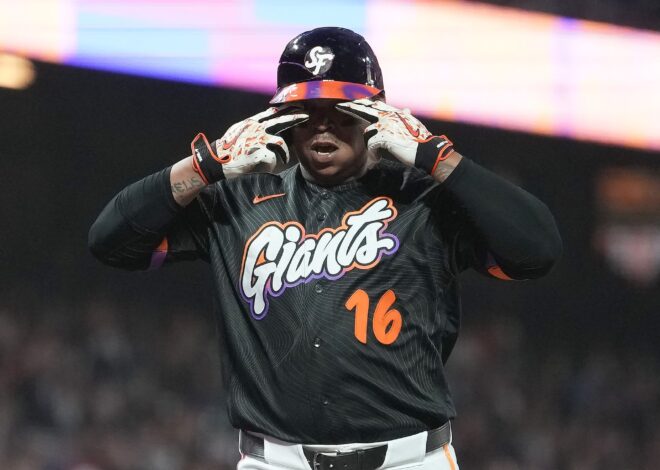 Rafael Devers bounces a homer into McCovey Cove as Giants beat Reds 3-1