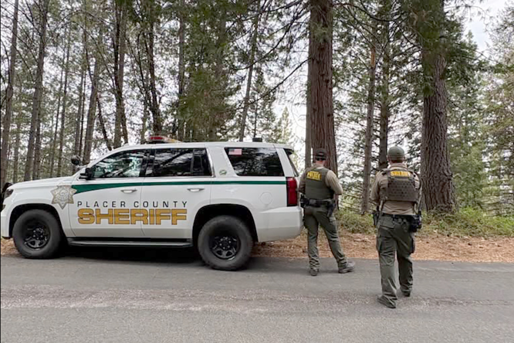 California suspect fleeing police breaks into home, kills woman, officials say