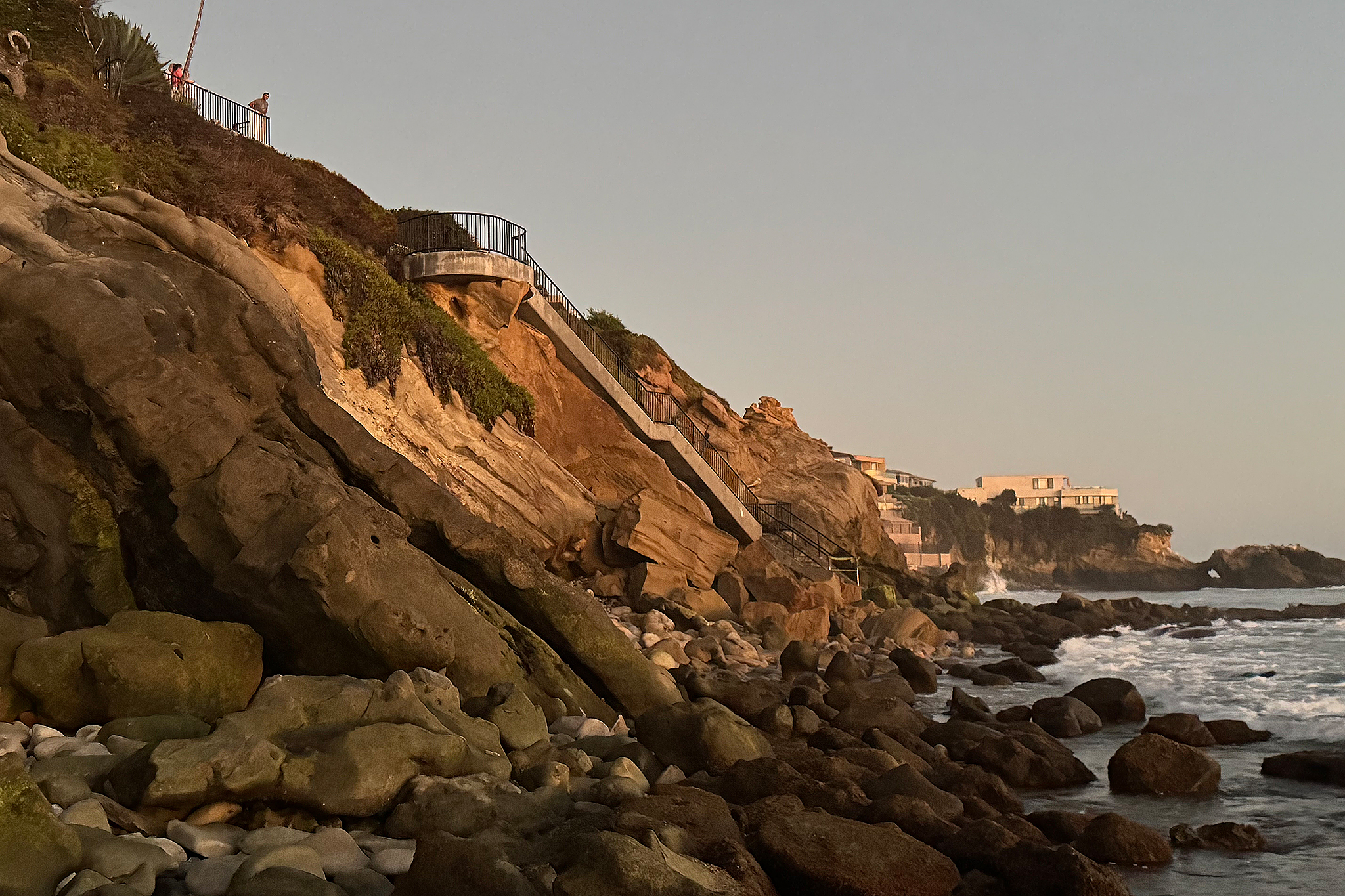Giant rockfall compromises Calif. beach route as waves pound shoreline